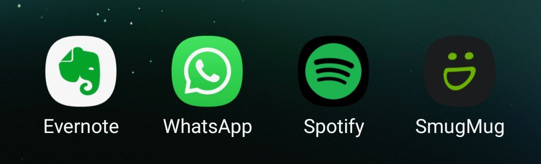 Four green apps on a phone, different shades of green.