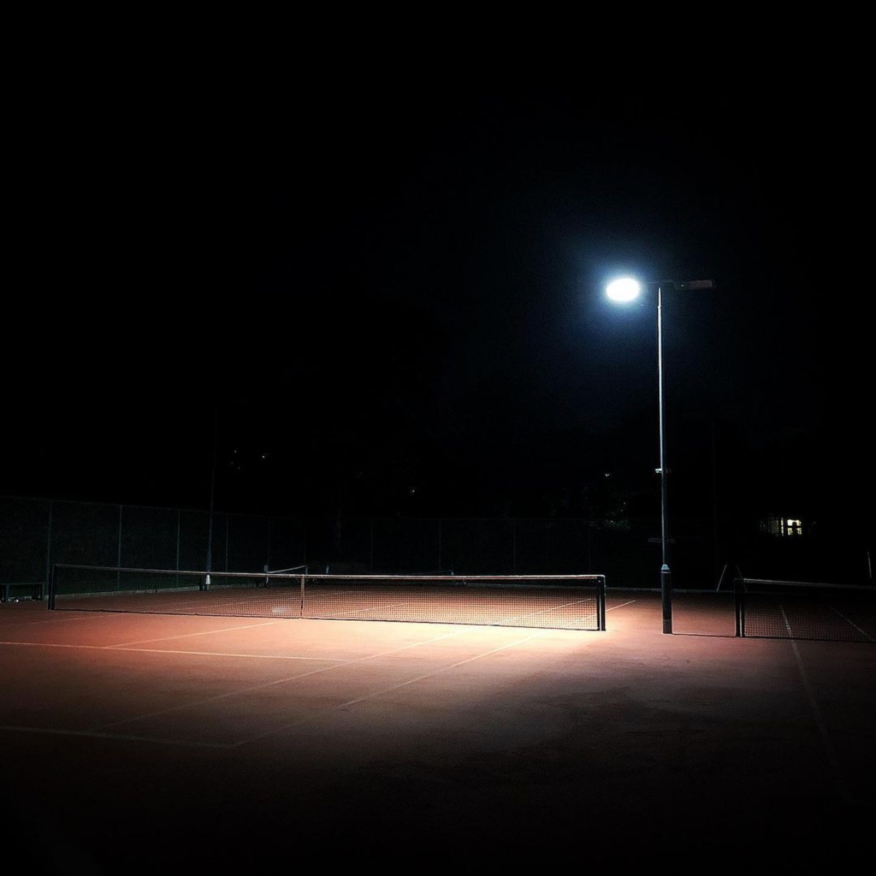 Tennis courts at night