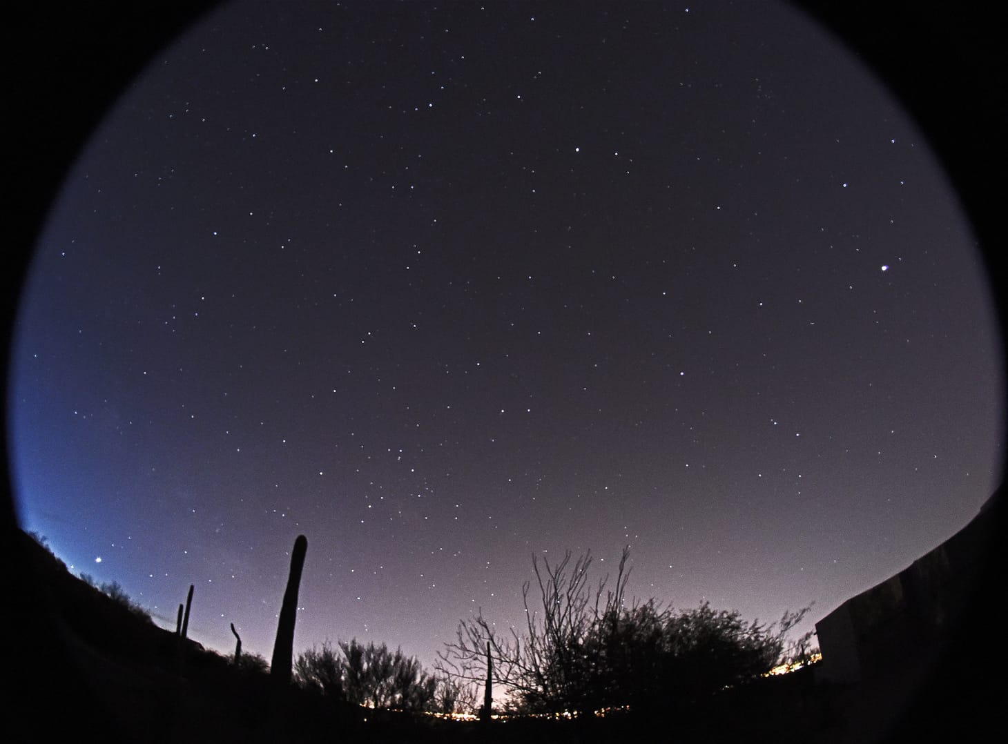 The night sky showing all five of the brightest planets against a backdrop of stars.